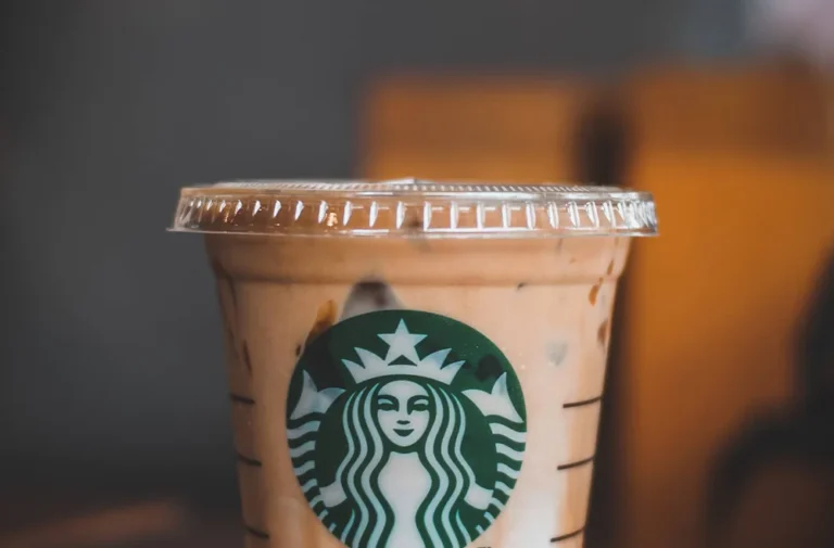 Starbucks Pink Drink with strawberries — a popular handcrafted drink to order with a new-member or birthday reward